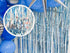 Light Blue Iridescent Foil Fringe Backdrop: Mermaid Party Decor (6.6 ft x 3.2 ft)