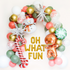 a christmas wreath with balloons and a gingerbread